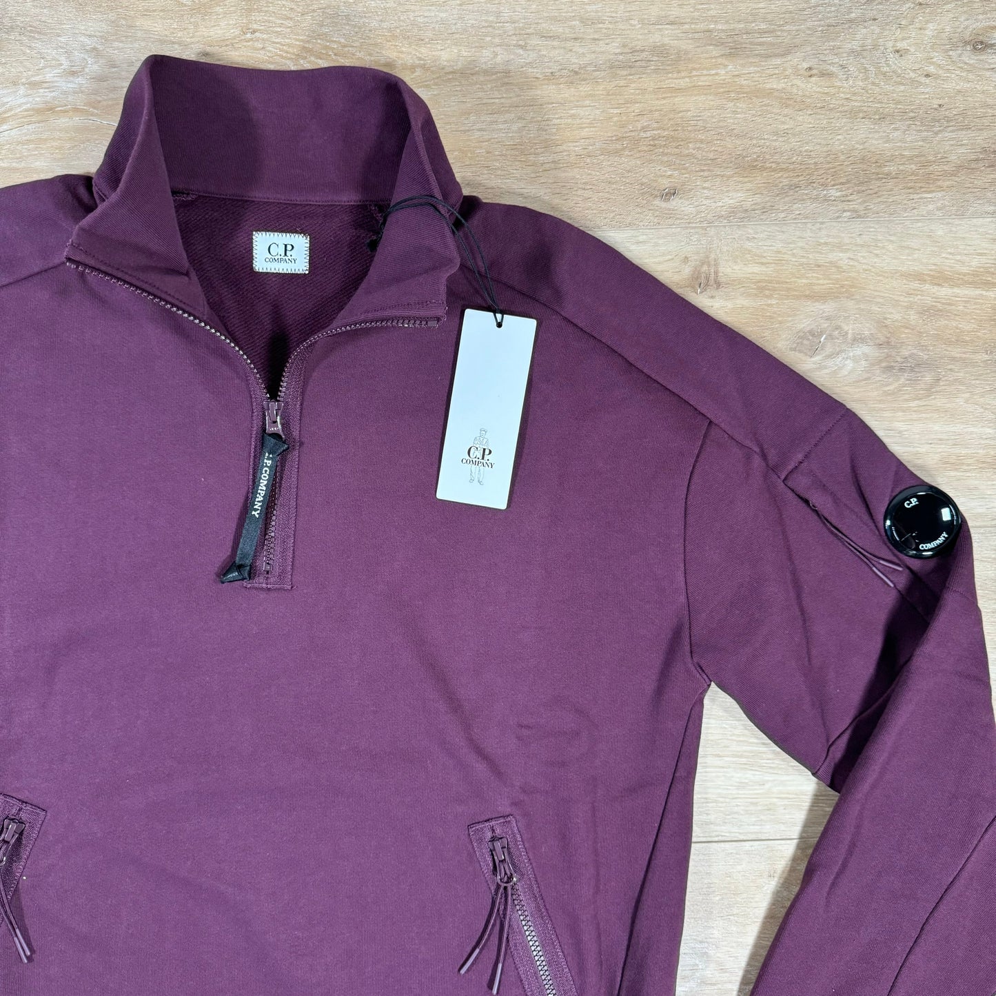 CP Company Diagonal Raised Half-Zipped Lens Sweatshirt in Potent Purple