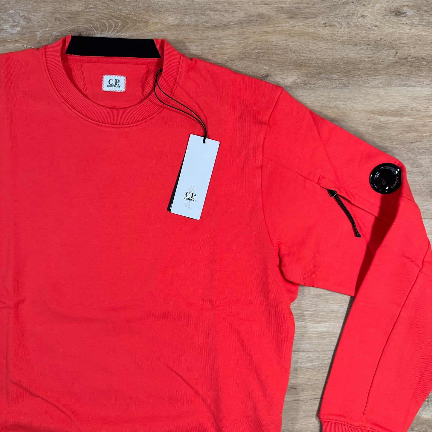 CP Company Diagonal Raised Fleece Lens Sweatshirt in Poinciana Orange